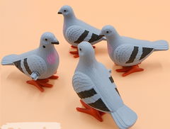Заводной механический голубь 9см